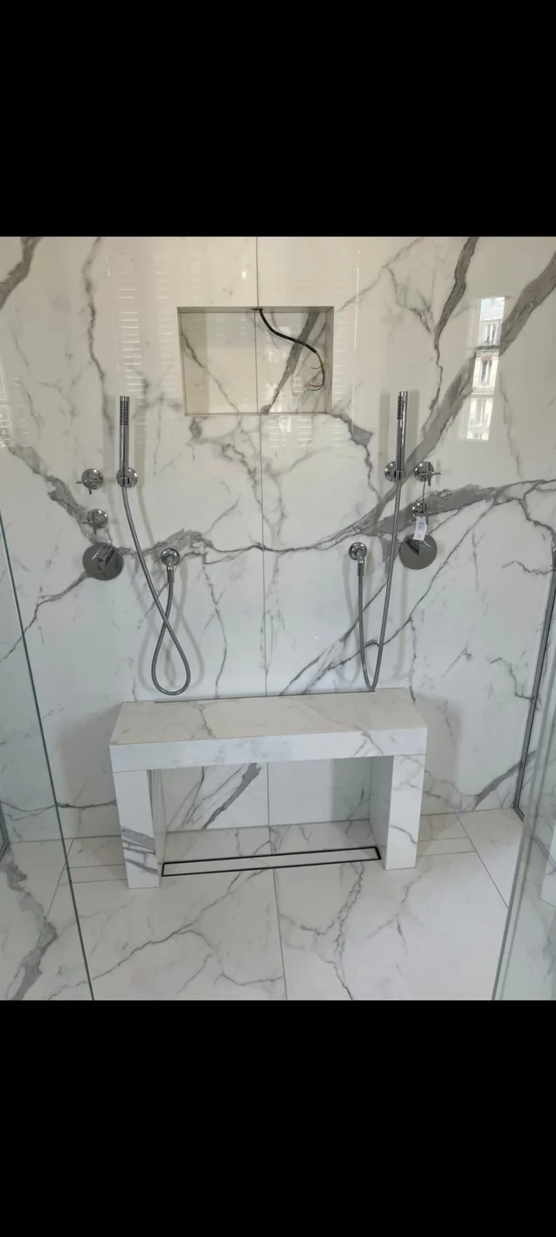 Shower wall tile and fixture openings in Berlin