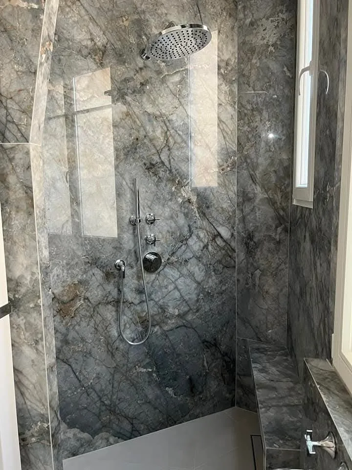 Dark stone-look tiled shower in Cromwell