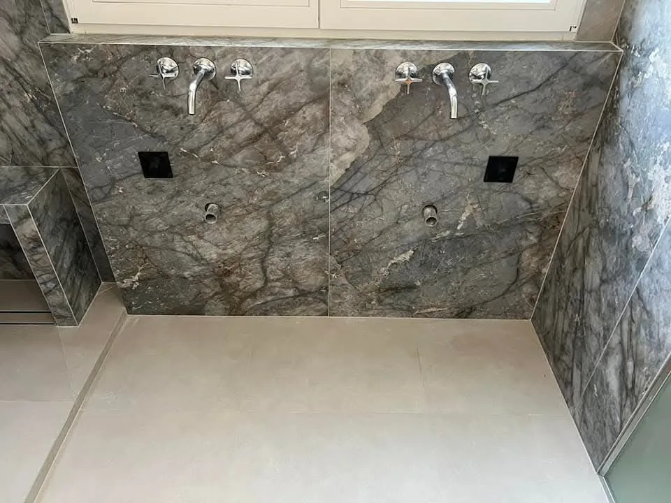 Shower floor and tiled walls in the Cromwell bathroom