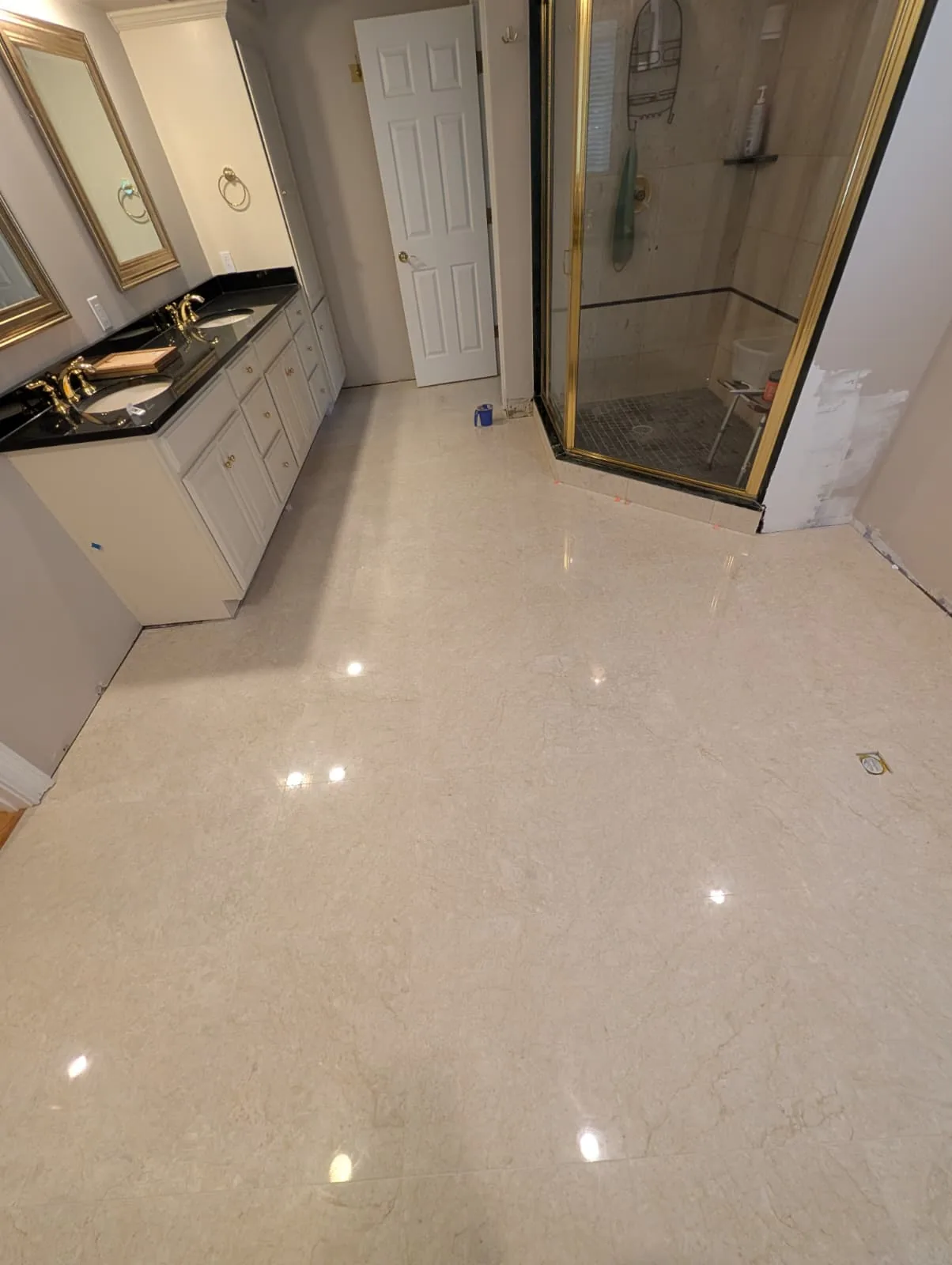 Pale tiled floor and shower in Wethersfield