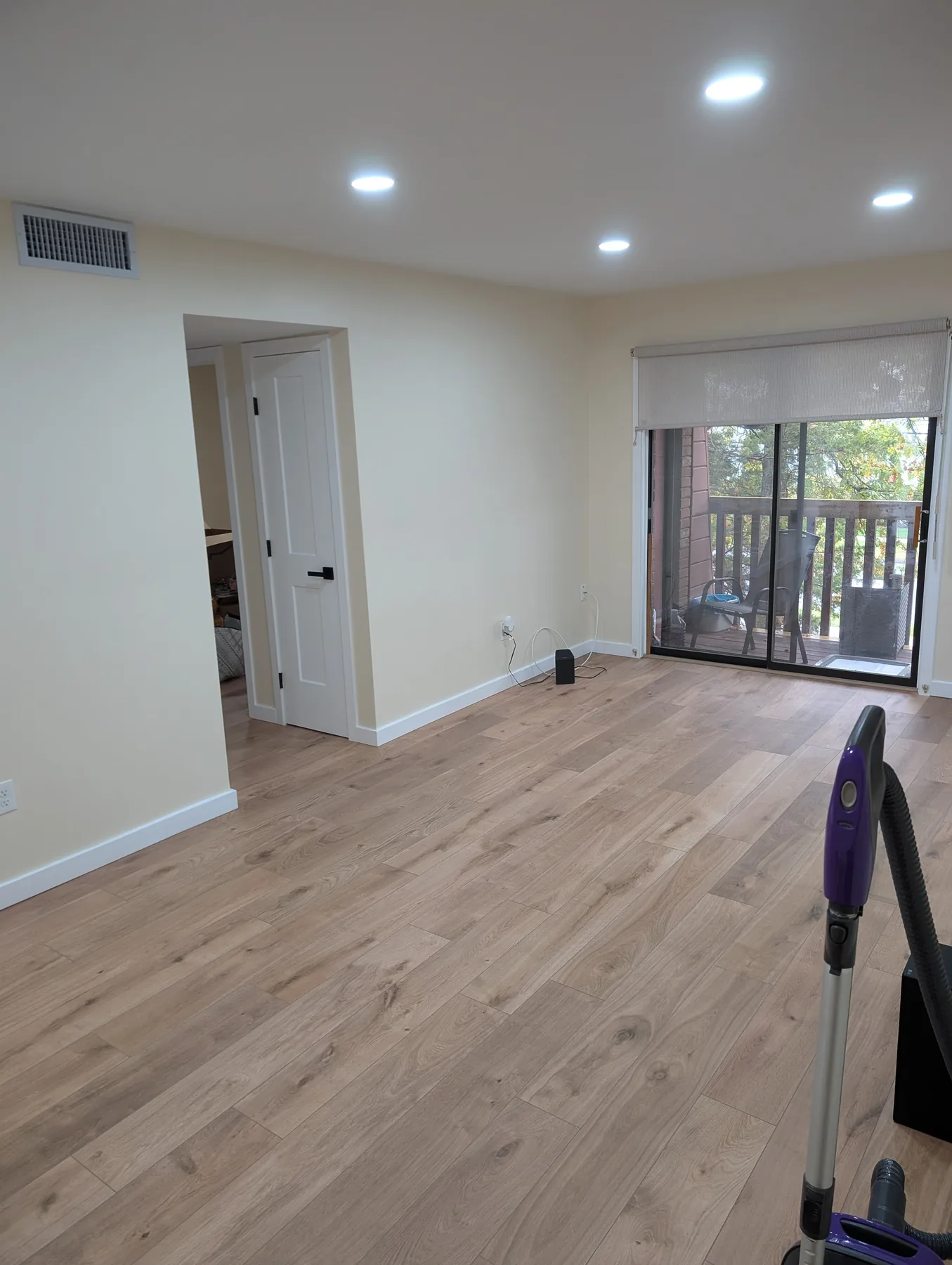 Light wood-look floor in a Newington, Connecticut living area