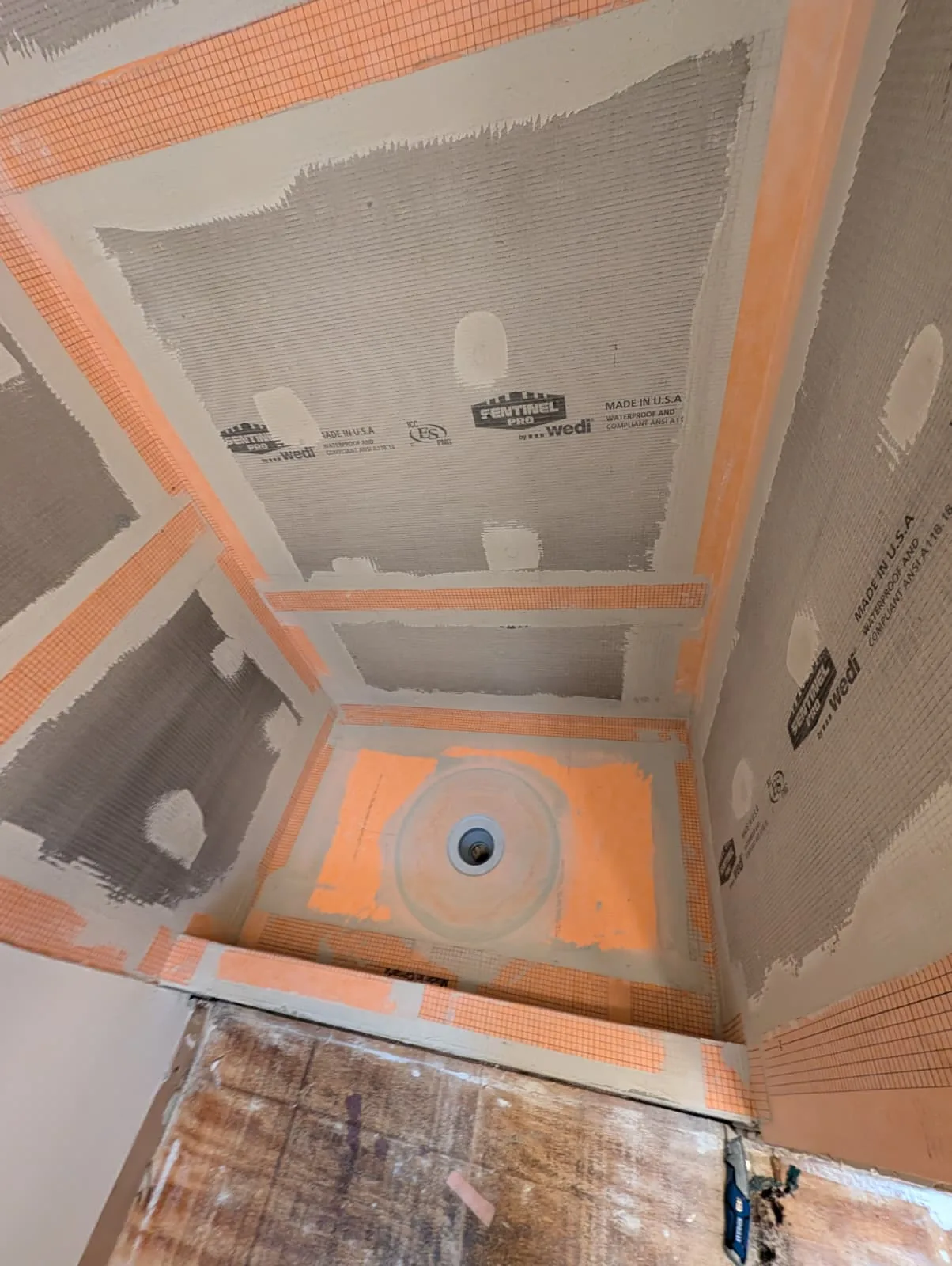 Waterproofed shower base in a Renovations Senga project; town not specified